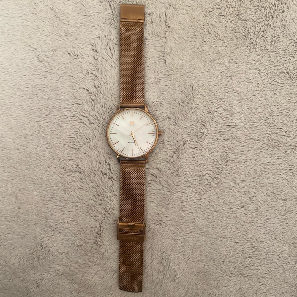 Women’s rose gold with pearl dial MVMT watch